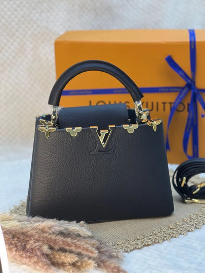 LOUISE VUITTON CAPUCINCS