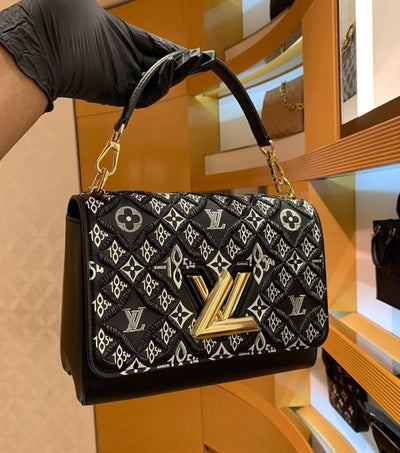 *LOUIS VUITTON
SINCE 1854 TWIST MM BAG
