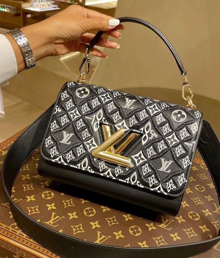 *LOUIS VUITTON
SINCE 1854 TWIST MM BAG