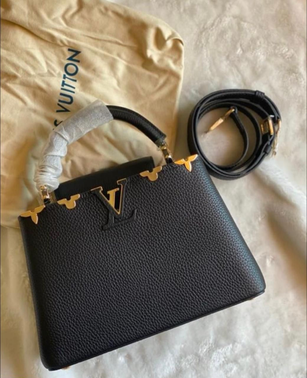 LOUIS VUITTON
BLACK TAURILLON LEATHER FLOWER  CAPUCINES PM BAG