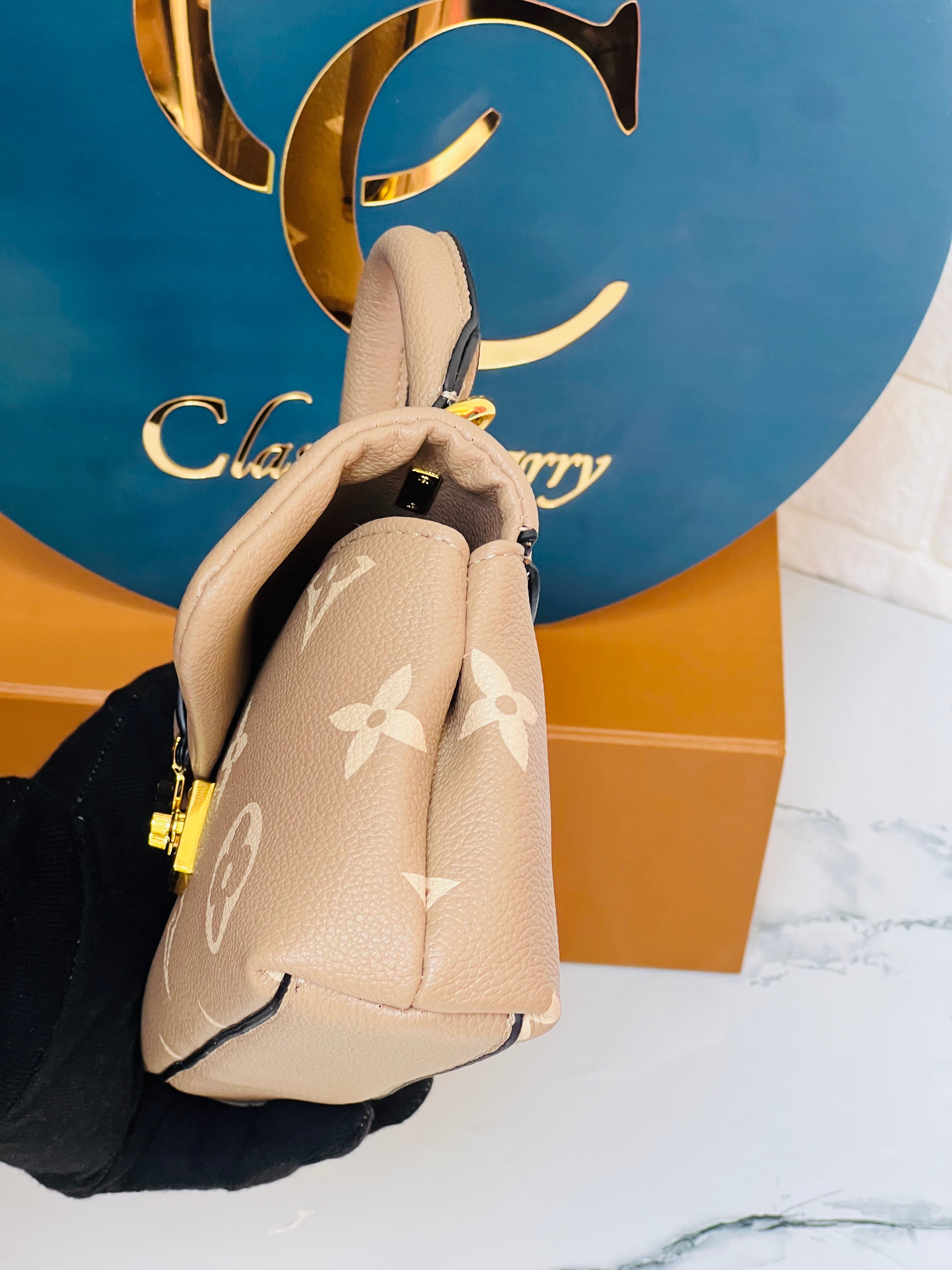 LOUIS VUITTON MONOGRAM MADELEINE MM BAG