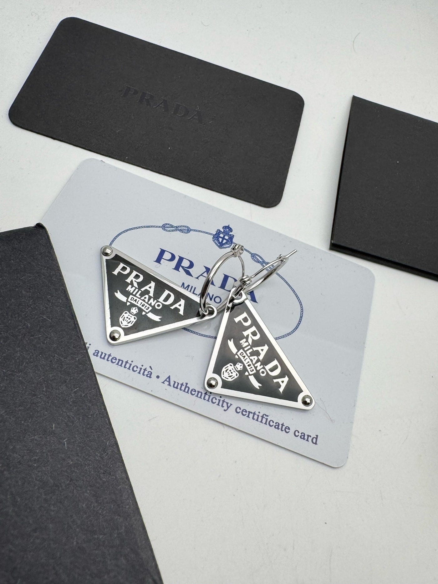 PRADA Prada Symbole pendant right earring
