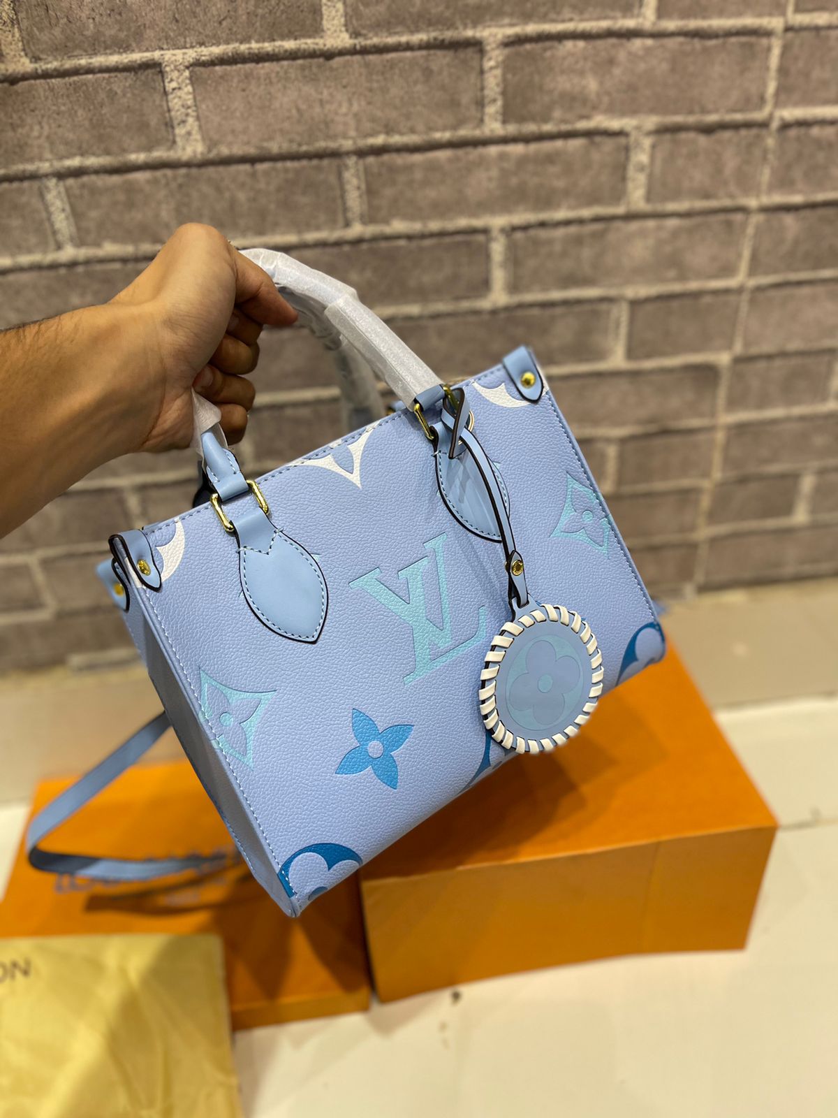 LOUIS VUITTON ON-THE-GO PM