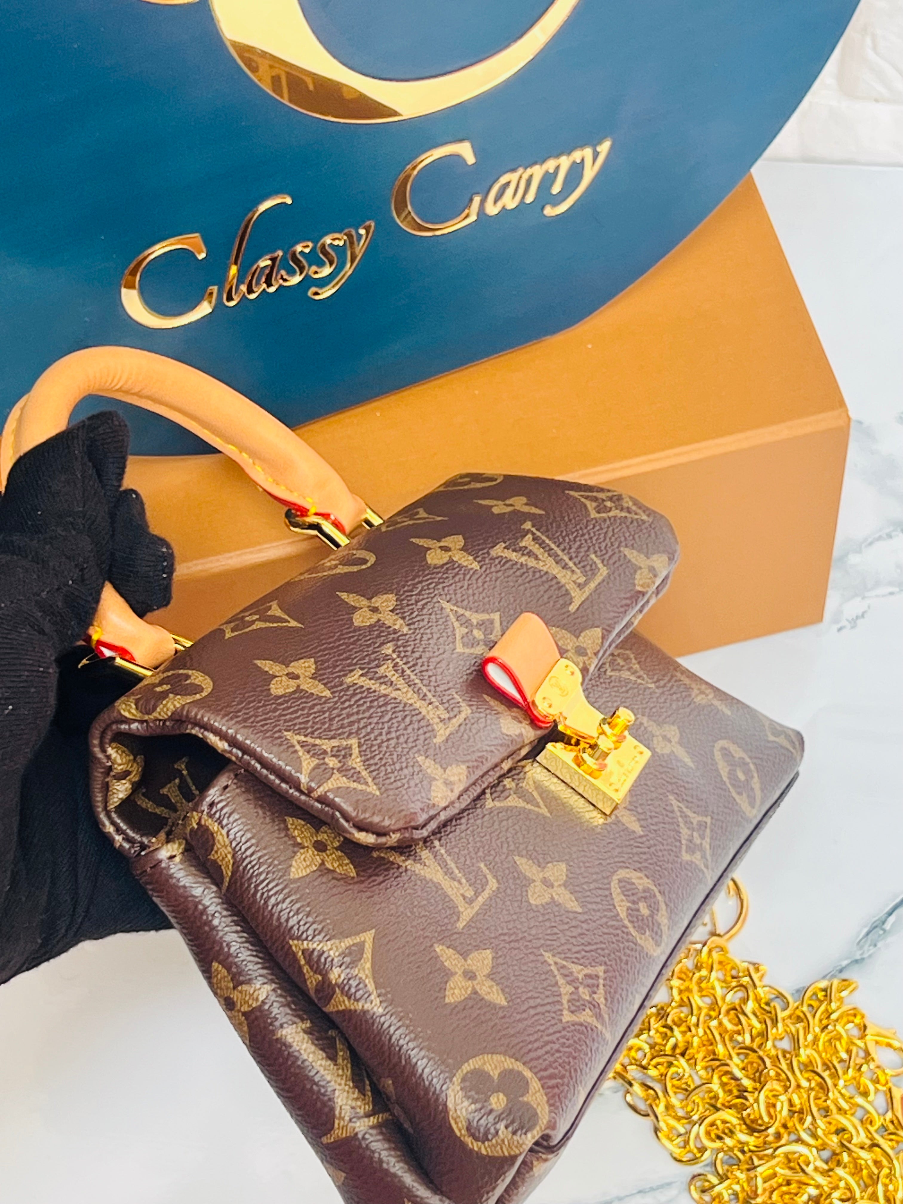 LOUIS VUITTON MONOGRAM MADELEINE MM BAG