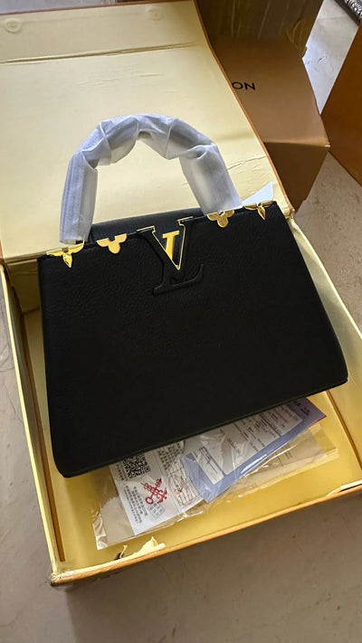 LOUISE VUITTON CAPUCINCS