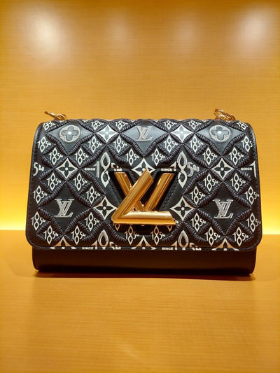 *LOUIS VUITTON
SINCE 1854 TWIST MM BAG