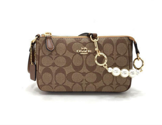 COACH 
NOLITA 19 IN SIGNATURE CANVAS