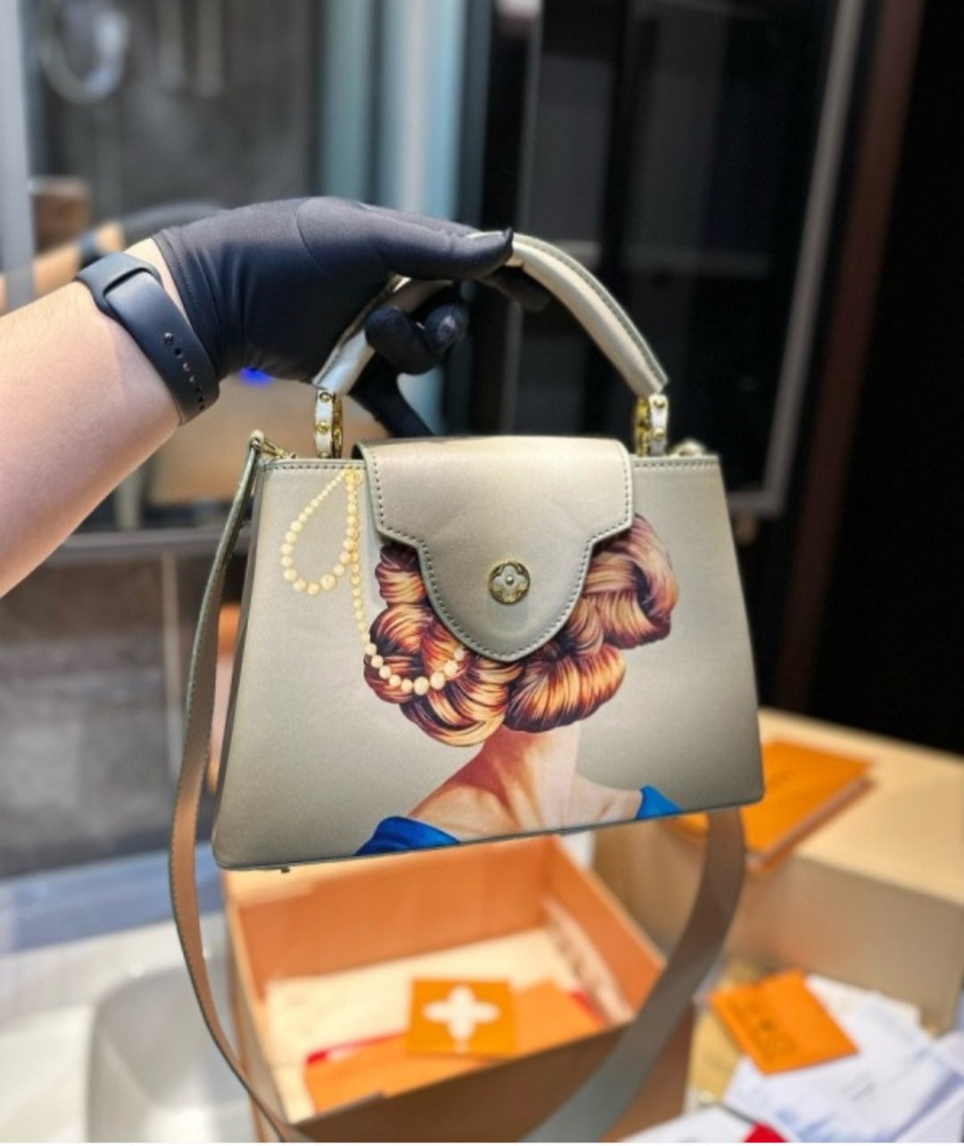 LOUISE VUITTON CAPUCINCES