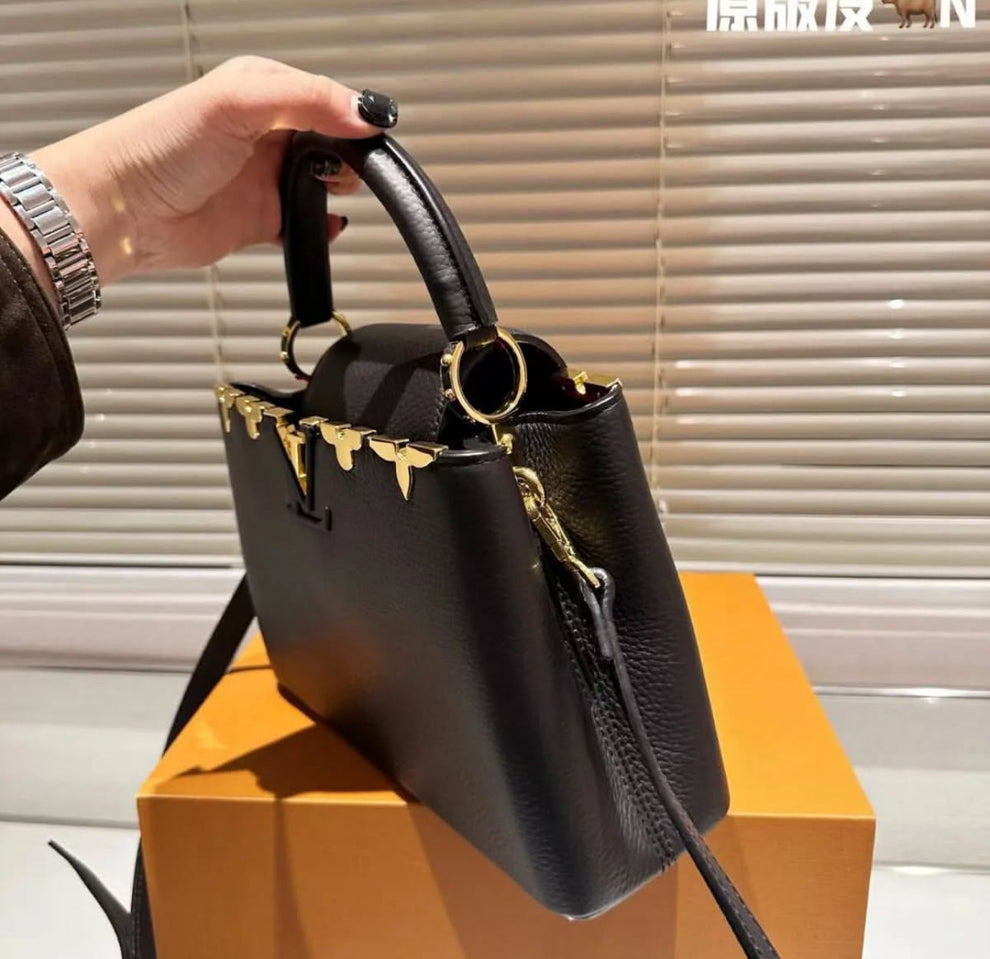 LOUIS VUITTON
BLACK TAURILLON LEATHER FLOWER  CAPUCINES PM BAG