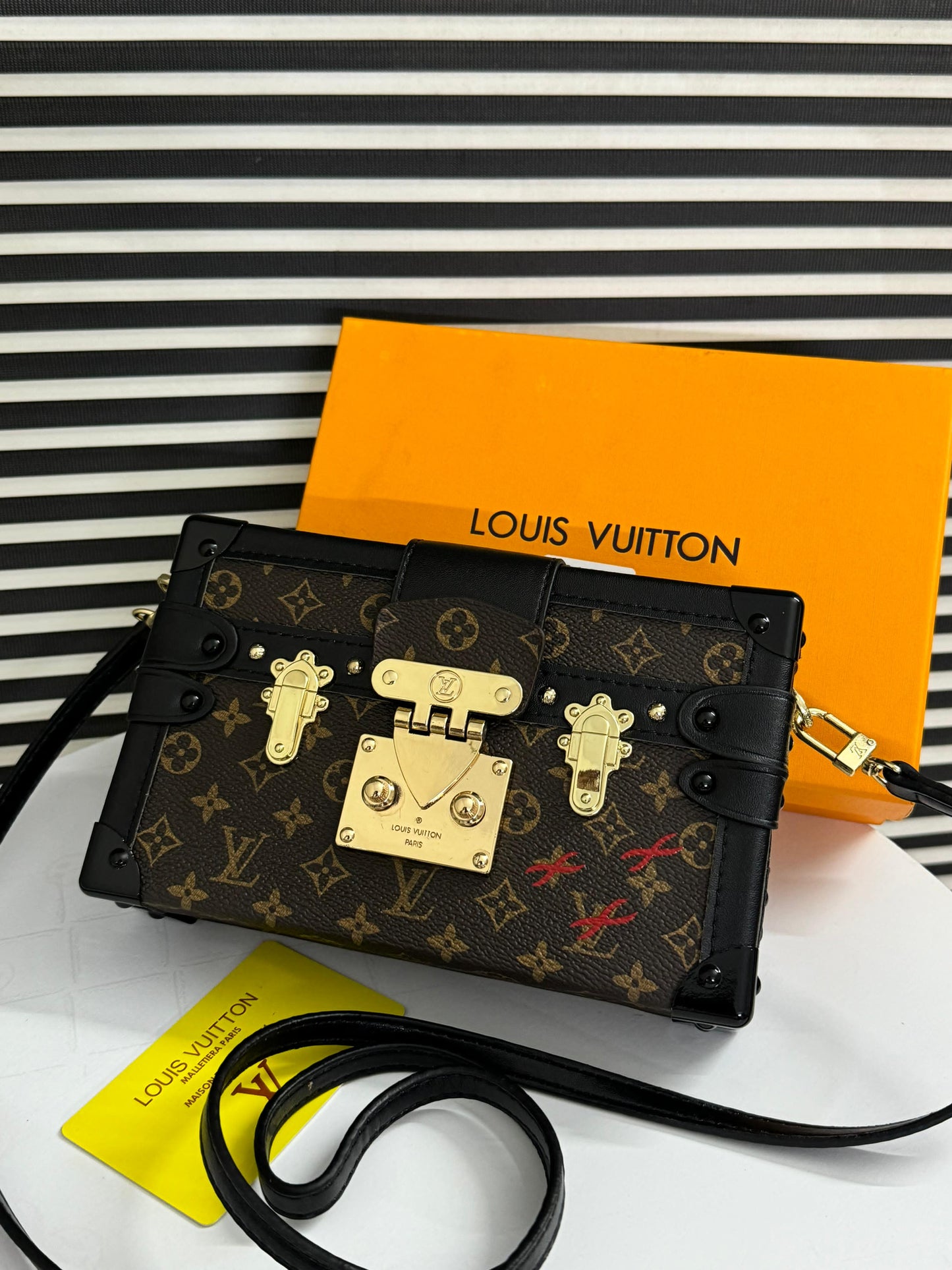 LOUISE VUITTON PETITE MALLE