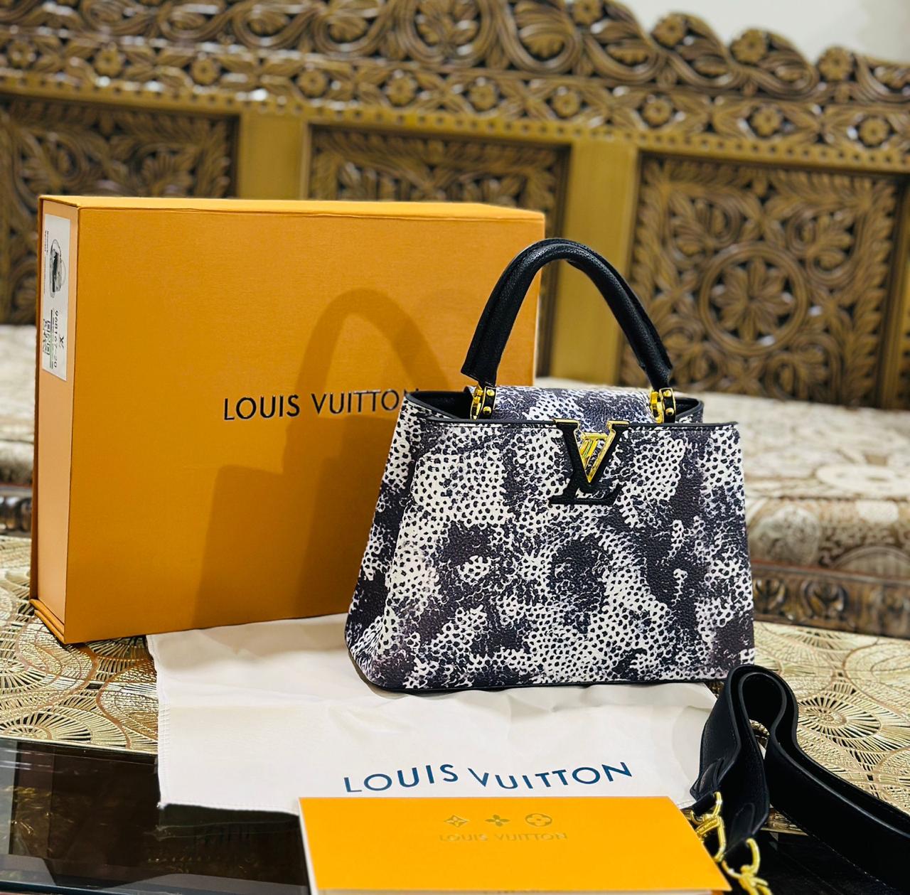 LOUISE VUITTON CAPUCINES